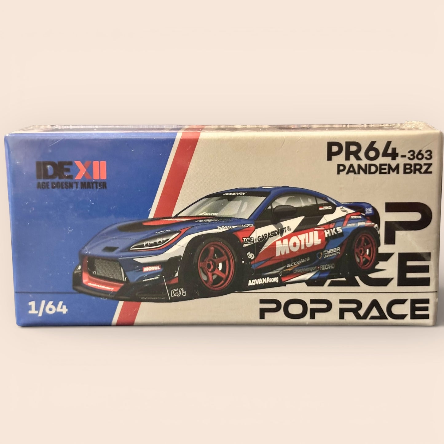 Model car packaging with 'Pop Race' branding on a beige background