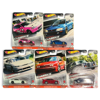 Five Hot Wheels Classics die-cast toy cars in their original blister packaging, arranged on a plain white background. The cars include a pink Nissan Sentra, a blue Nissan Silvia S15, a white Nissan Sentra R32, a red Honda Civic Type R, and a black Mercedes-Benz A-Class.