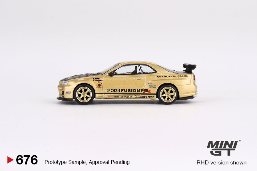 [Box] Mini GT Nissan Skyline GT-R (R34) Top Secret Top Secret Gold #676