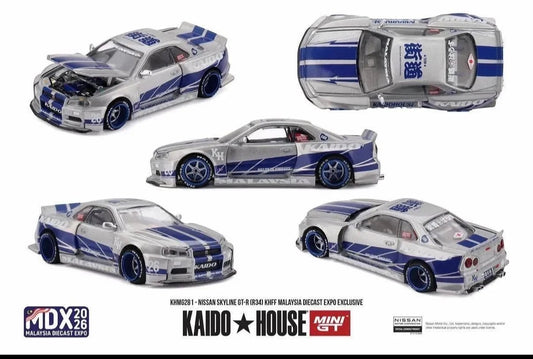 DiecastYard KAIDO HOUSE Nissan Skyline GT-R R34 diecast model in silver and blue with racing livery and opening hood.
