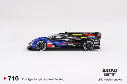 DiecastYard Mini GT Cadillac V-Series.R #2 race car, 2023 Le Mans 3rd place, blue and black livery, side profile.
