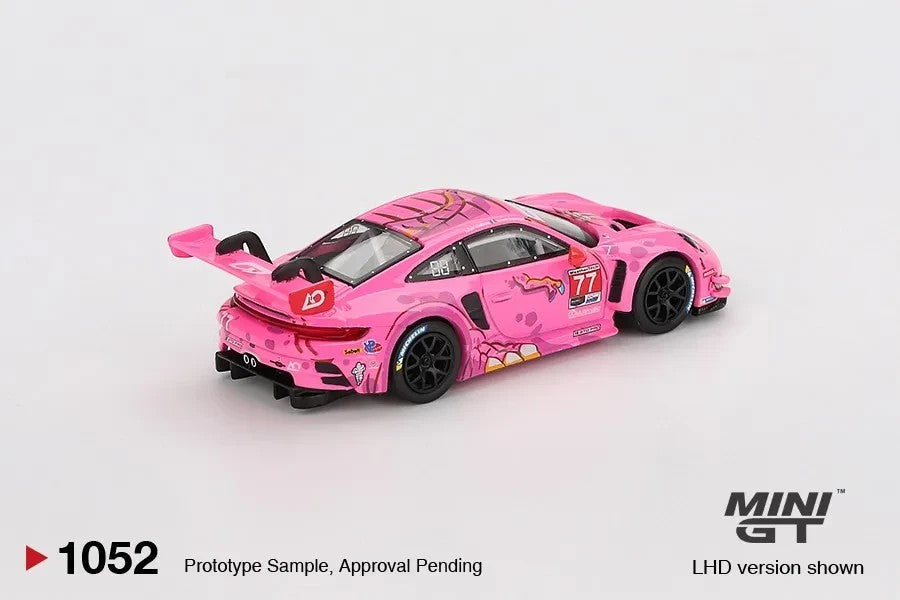 DiecastYard Mini GT Porsche 911 GT3 R #77 AO Racing Roxy diecast car in pink with racing decals