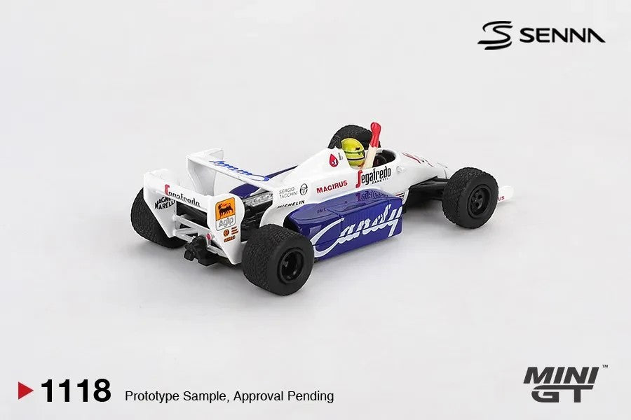 DiecastYard Mini GT TG184 Ayrton Senna 1964 Monaco Grand Prix diecast race car in white and blue with sponsor decals