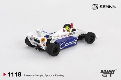 DiecastYard Mini GT TG184 Ayrton Senna 1964 Monaco Grand Prix diecast race car in white and blue with sponsor decals
